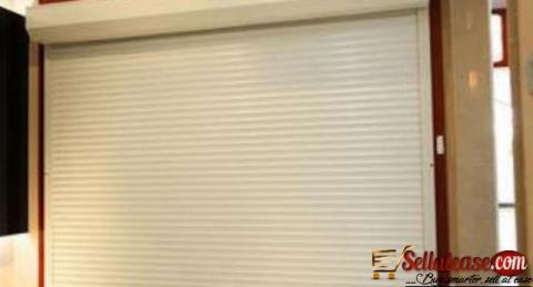 White Perforated Rolling Shutters Garage Door BY HIPHEN SOLUTIONS