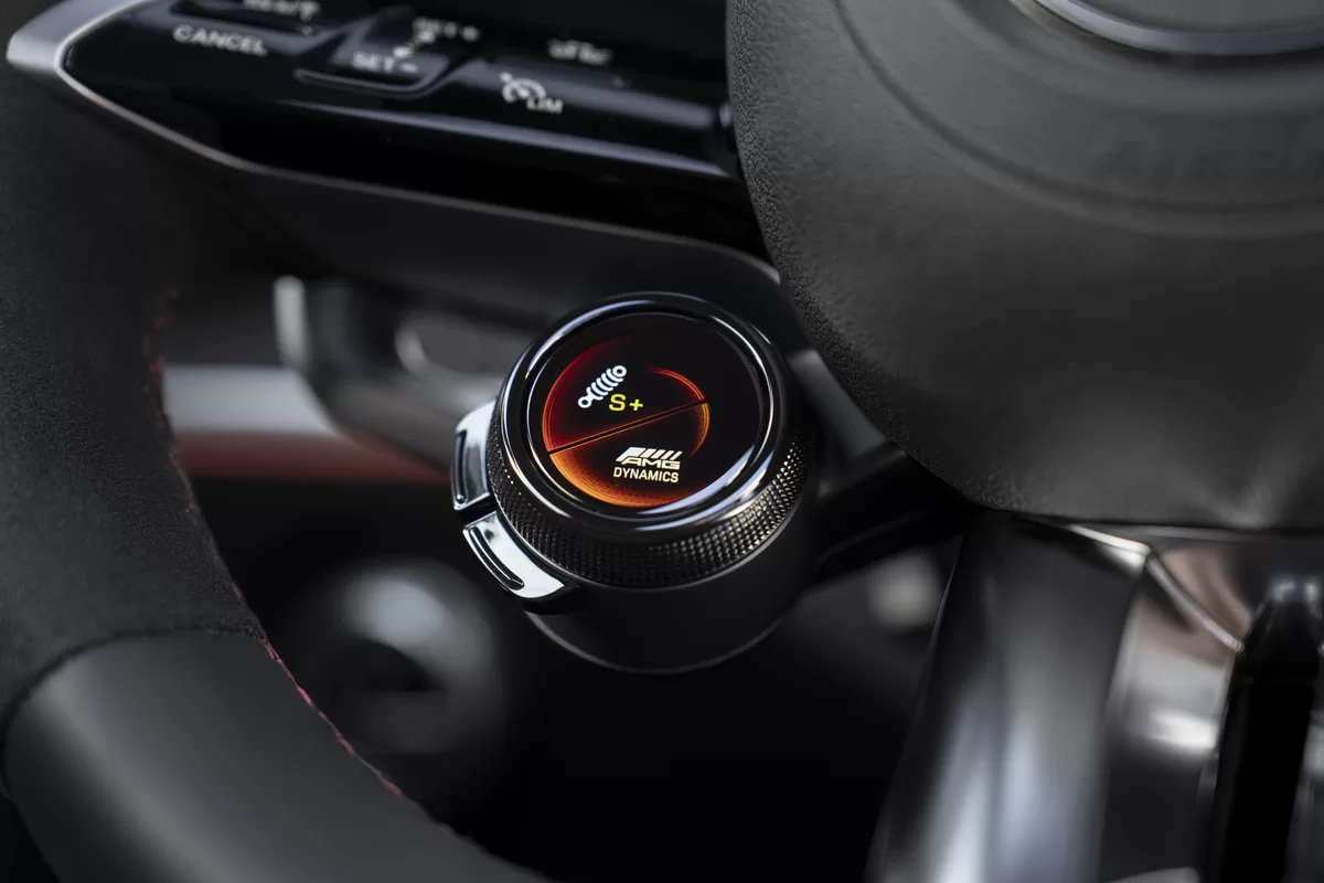The standard AMG Performance steering wheel with a double-spoke design and flattened bottom on the CLE Coupe