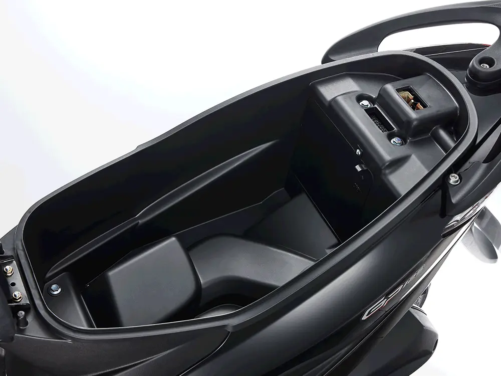 Large storage compartment under the seat